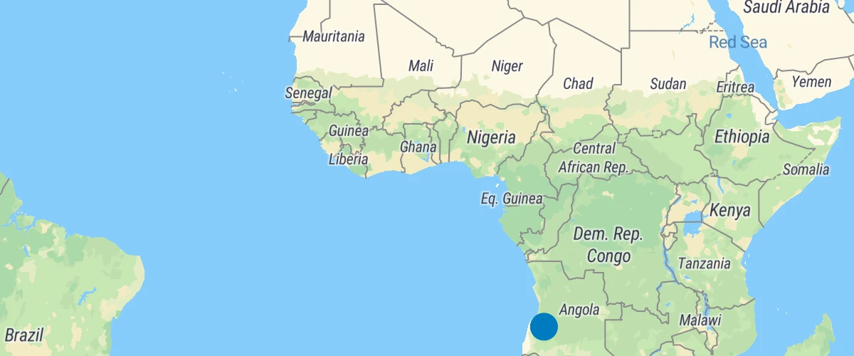 Animate the position of a point by updating a GeoJSON source on each frame.